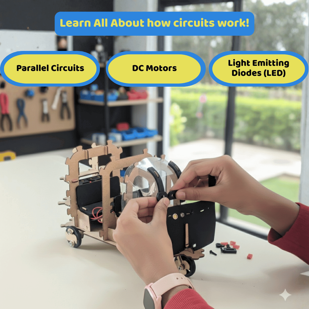 Child assembling a mechanical model with educational text about circuits on a table.